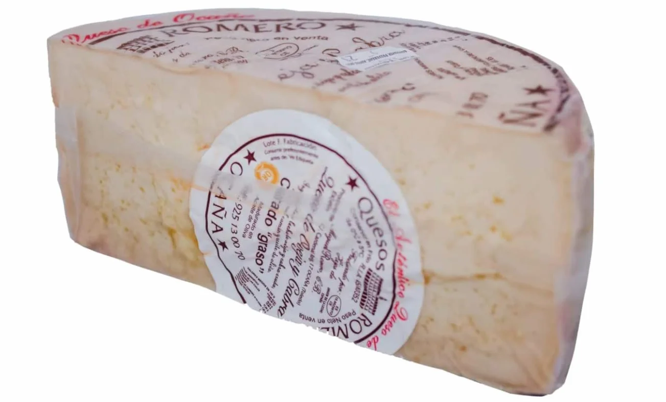 1/2 QUESO ROMERO OCAÑA para paladares exquisitos, graso, mantecoso, con pique, granuloso y quebradizo, color ocre, debido a su larga maduración de hasta 2 años