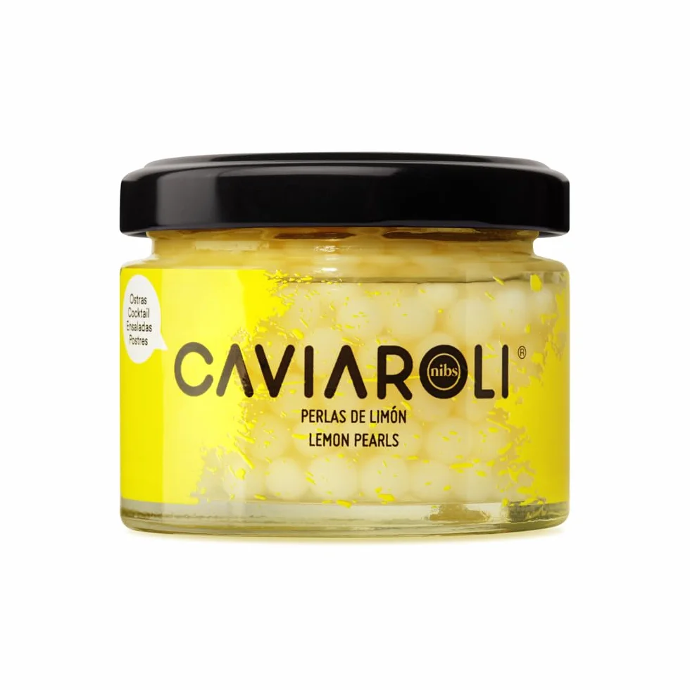 Perlas de jugo de Limón Gourmet para Aliño o Decoración bote 50gs. Esferas de jugo de Limón en su interior líquido, estallan en la boca cuando las muerdes. Color amarillo y sabor ácido y de limón.