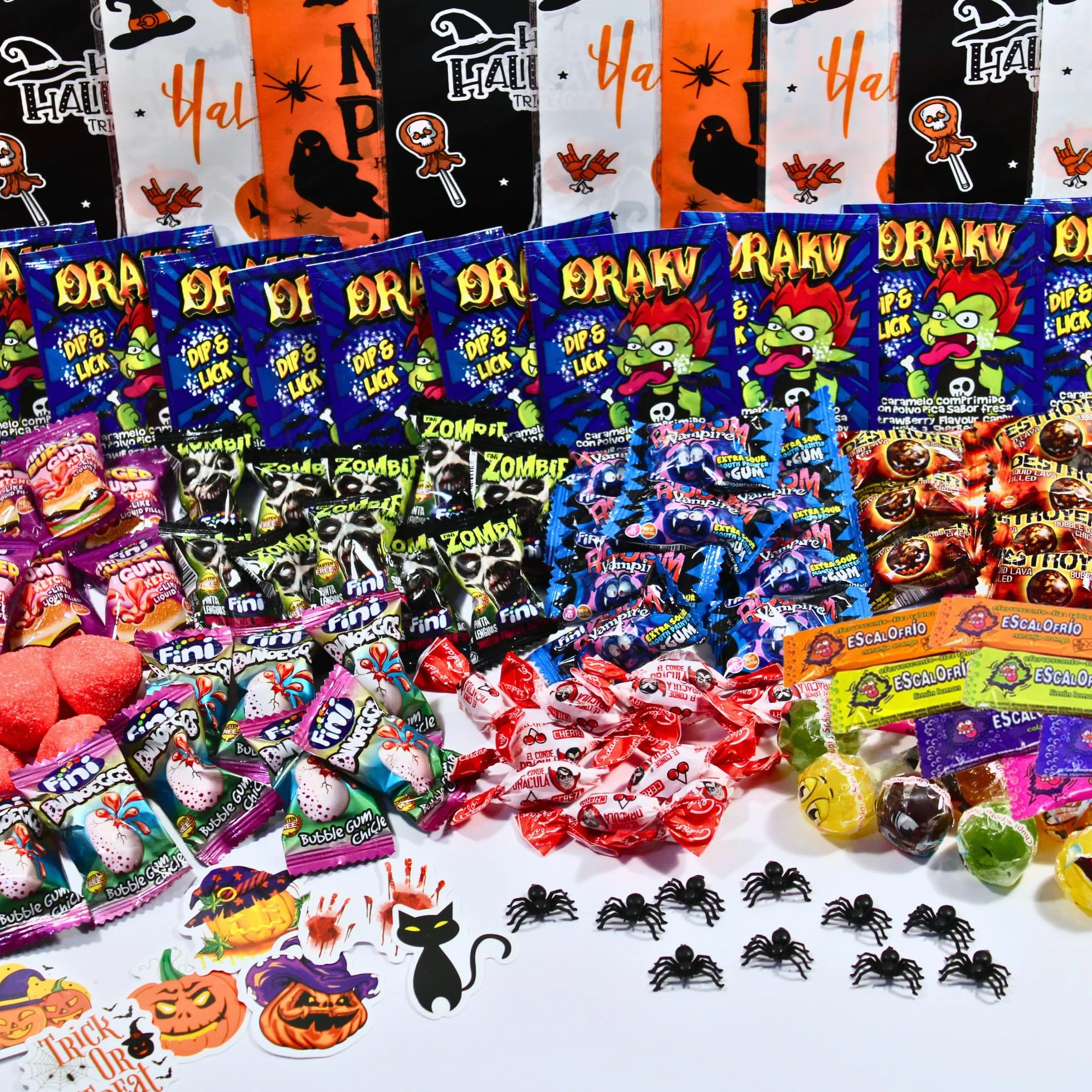 NEVALÜ Pack Halloween 100 Chuches + 10 Bolsas + 10 Pegatinas + 10 Arañas de Juguete. Surtido Envuelto Individualmente.