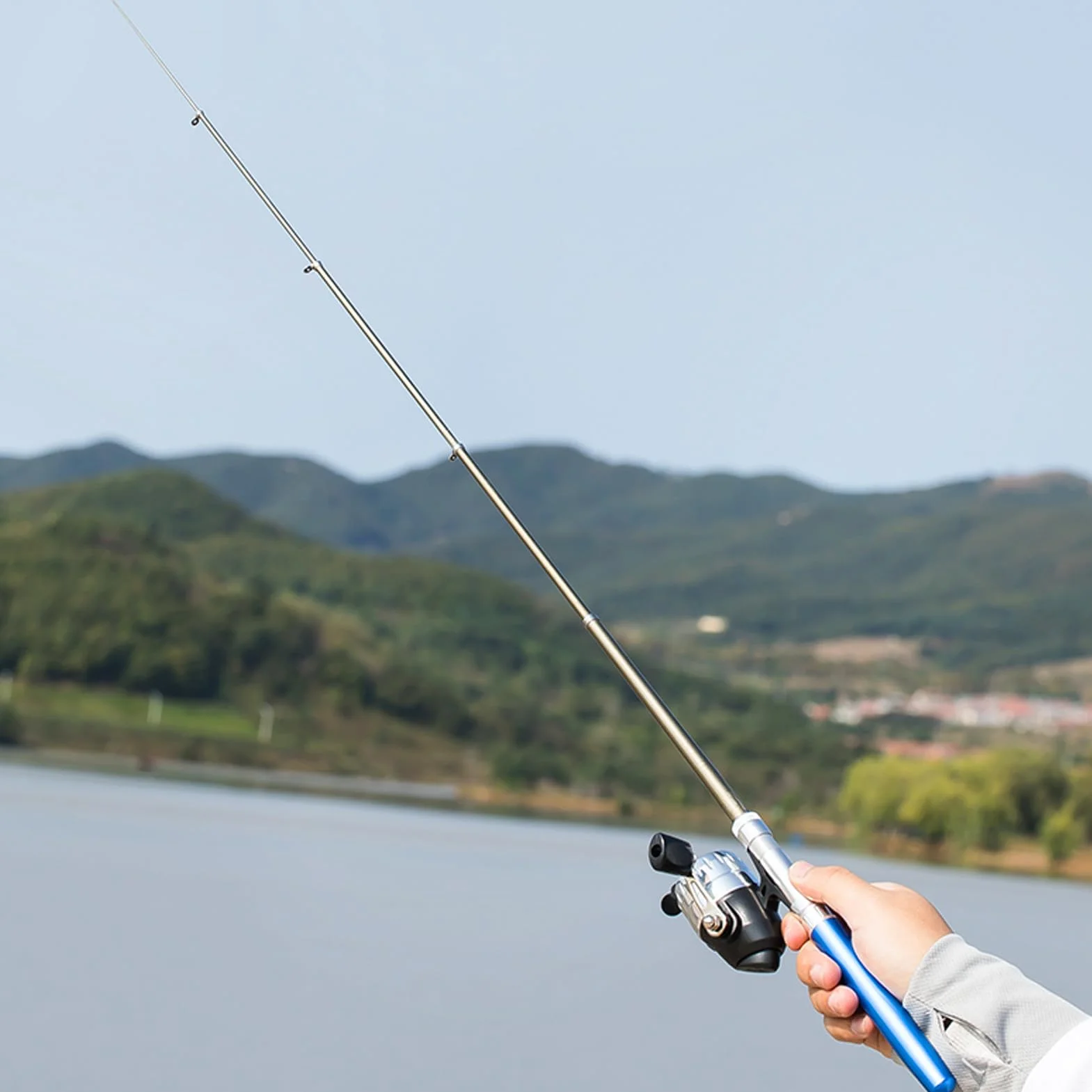 Kit de caña de pescar telescópico portátil con bolsillo carrete giratorio para viajes agua salada dulce