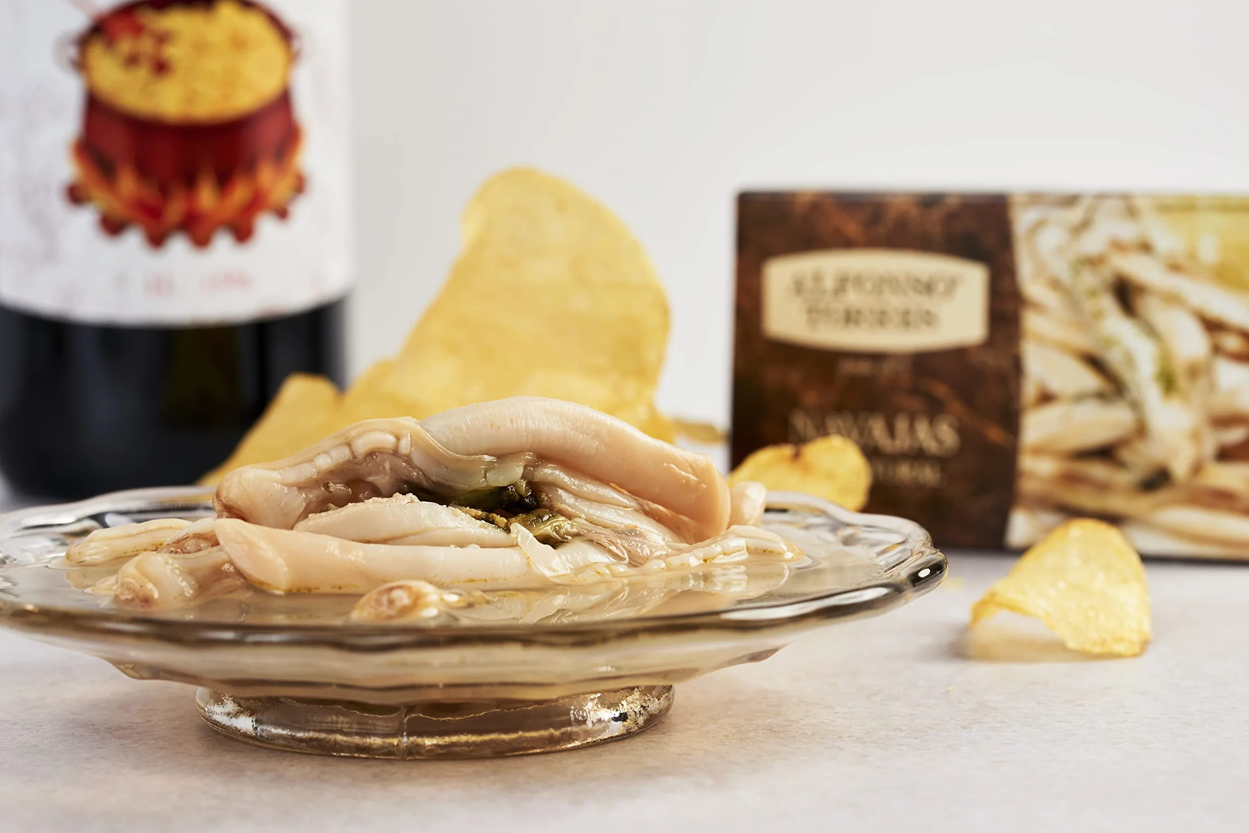 Navajas al natural. Peso Neto 111 gramos. Peso Escurrido 63 gramos. Categoría Gourmet. Con ingredientes 100% Naturales: Navajas, Agua y Sal. Alfonso Torres.